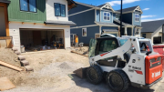 Concrete crew preparing driveway 