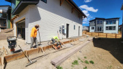 Concrete crew preparing east sidewalk