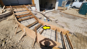 Stairs to front porch with steel rebar are formed