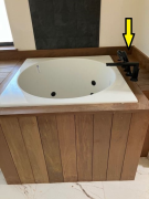 Plumbing fixtures installed - tub is complete