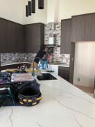 Range hood being installed