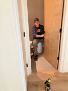 Wade installing door hardware