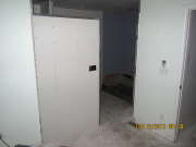 Drywall is installed on new wall